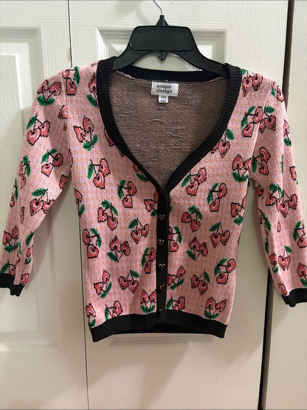 Unique Vintage Pink Cherry Cardigan with Black Trim never worn
